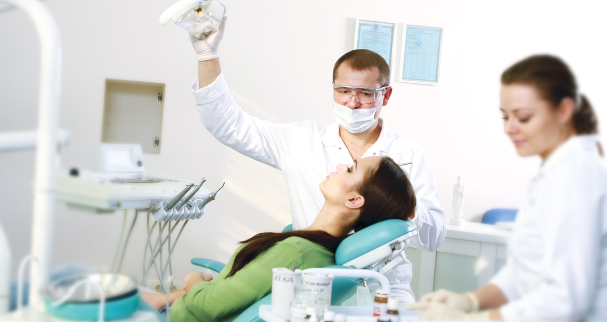 лечение зубов по купону